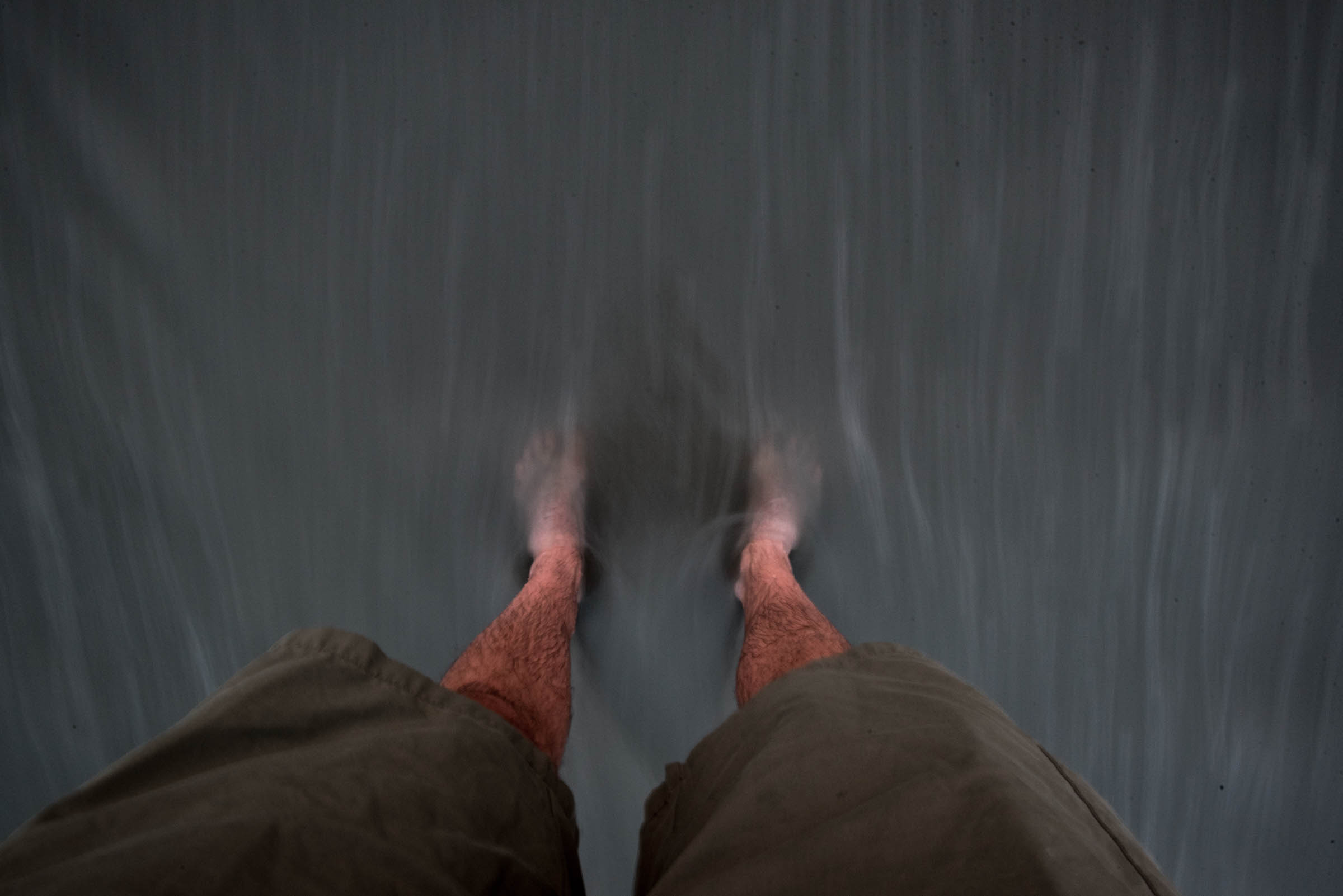 Ocean water rushing out past my feet on the beach